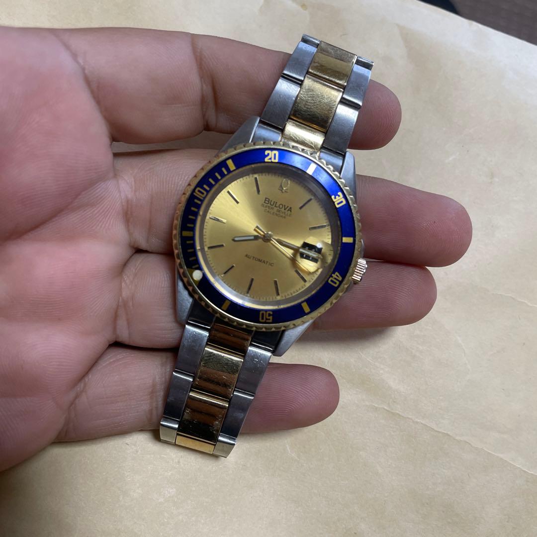 E*y様 Bulova 自動巻き 腕時計 金色/青色