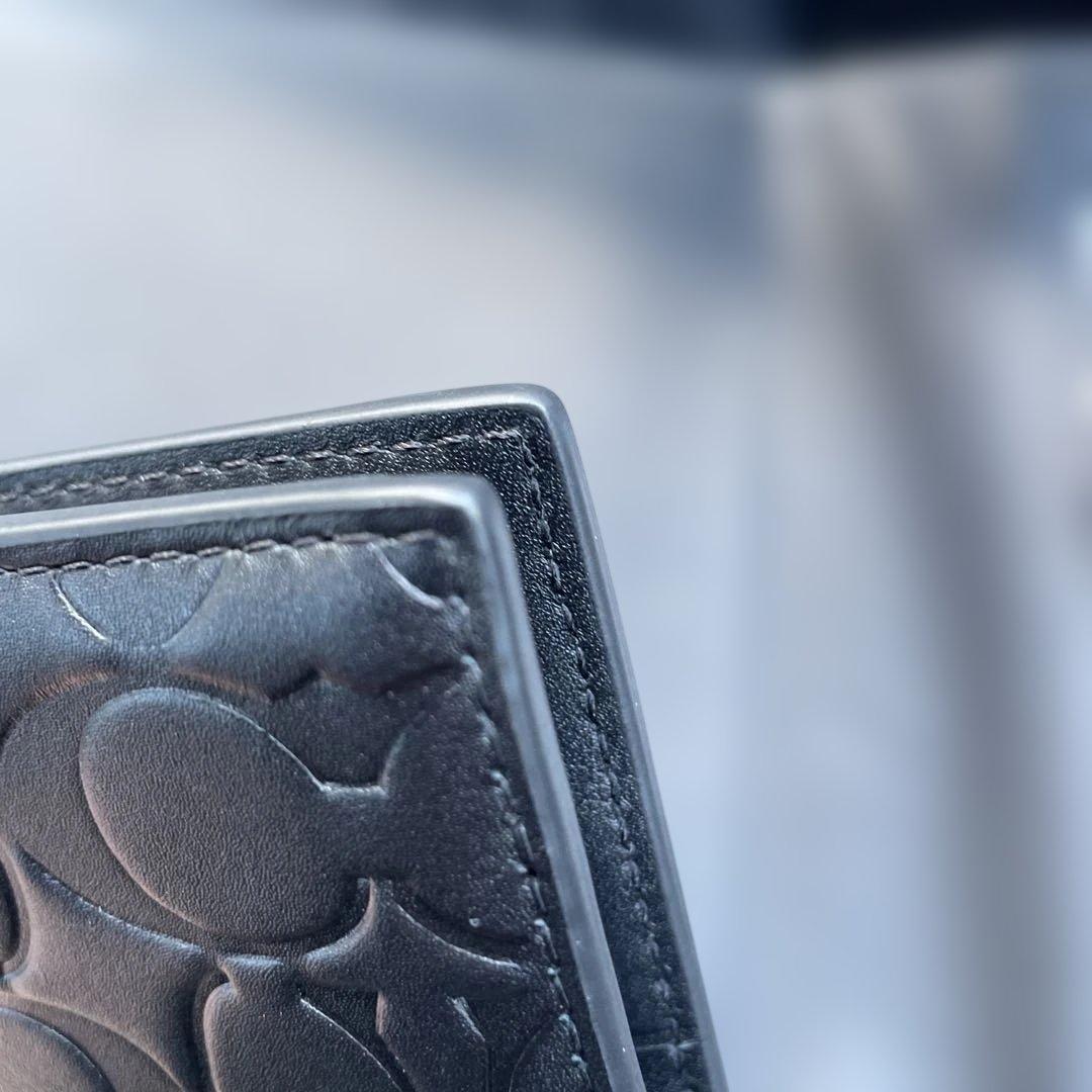 新品　定価55,000円　COACH ブラック　二つ折り財布 エンボス加工